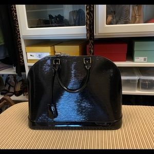 Louis Vuitton Alma Handbag
